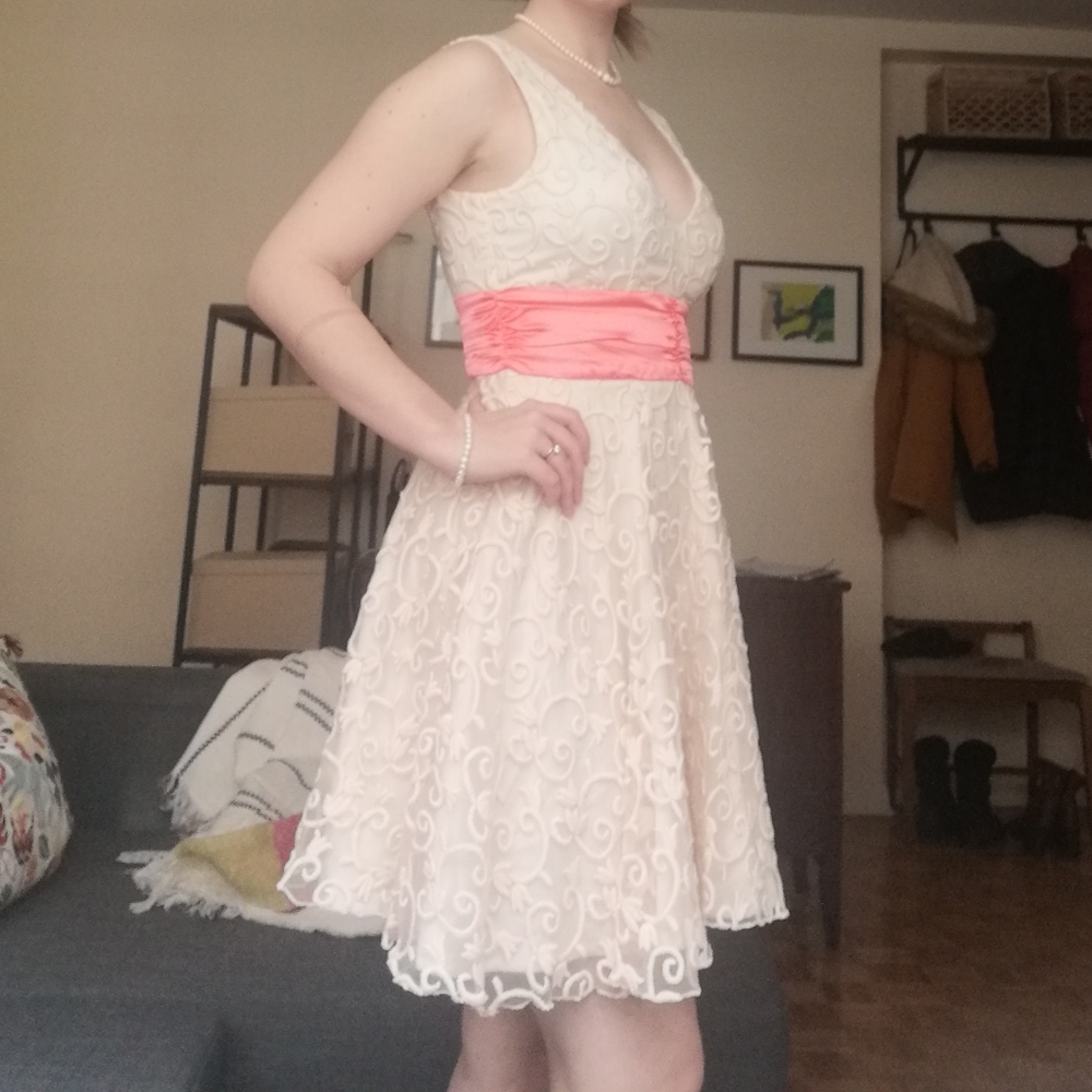 Cream and coral v-neck dress by Minuet